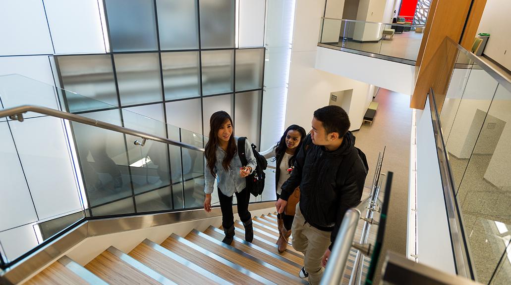 An image of students walking through TCC's Harned Center, the healthcare building on campus